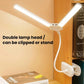Dual-head LED clip-on reading lamp with flexible gooseneck and white clip.