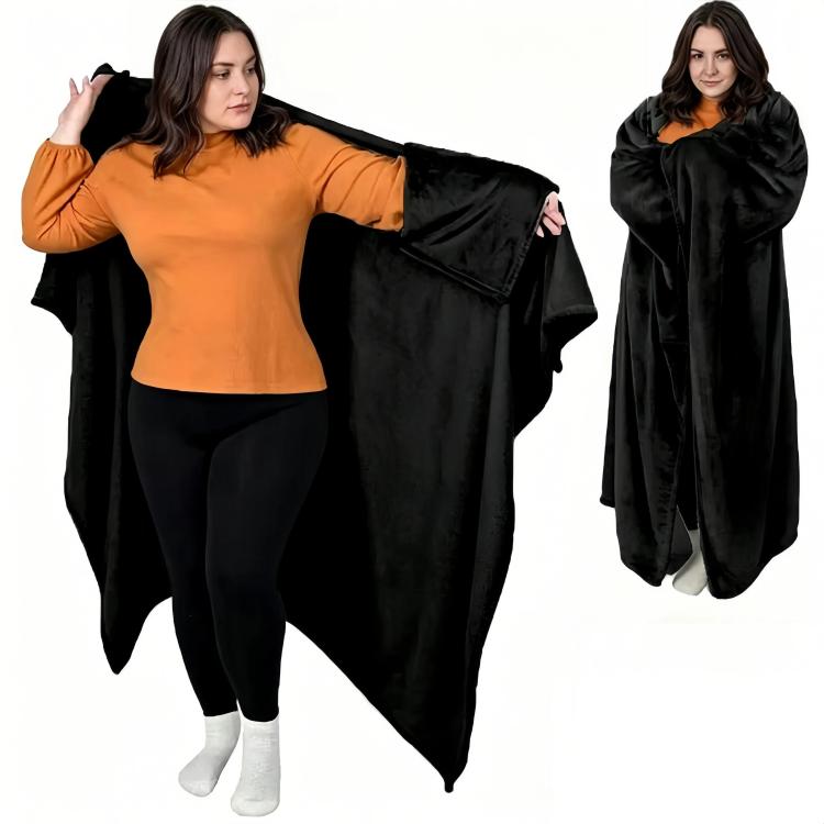 Black wearable blanket with sleeve openings, worn as a draped wrap