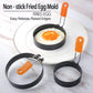 Set of round non-stick egg molds with orange silicone handles and raised rim