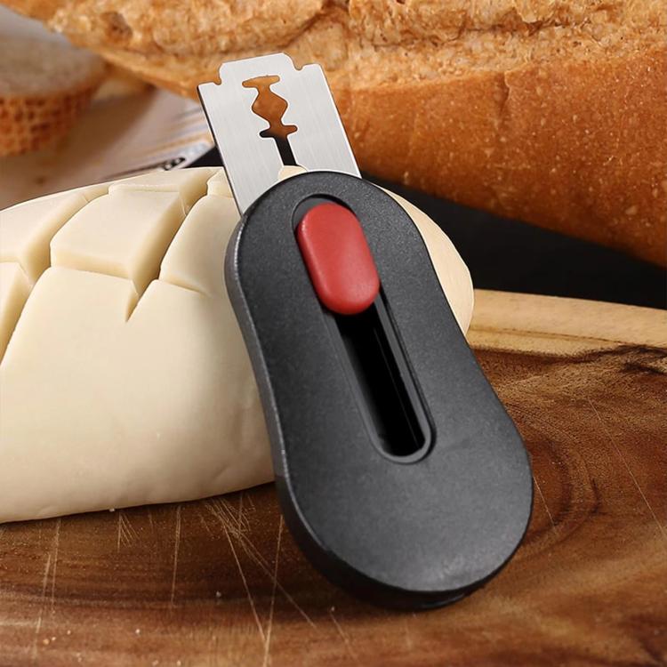 Retractable bread scoring knife with black handle and red button, blade ready