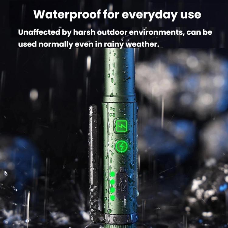 Green magnetic pen clip flashlight with dual buttons, rain droplets on body