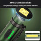 Green pen clip flashlight with LED head and bright beam, side indicator lights