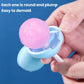 Pink lollipop ice pop held in a light blue silicone mold with a white stick