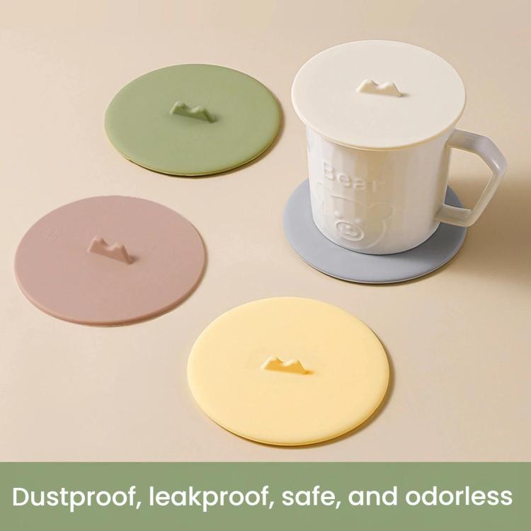 Silicone cup lids set with center tabs in green, pink, yellow, and white