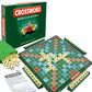Alphabet spelling board game set with green crossword board, letter tiles, and box packaging