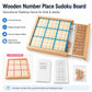 Wooden 9x9 number place sudoku board with blue compartments and sliding storage drawer