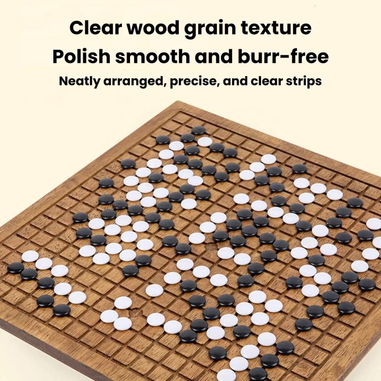 Brown wooden go board with black and white stones arranged on the grid
