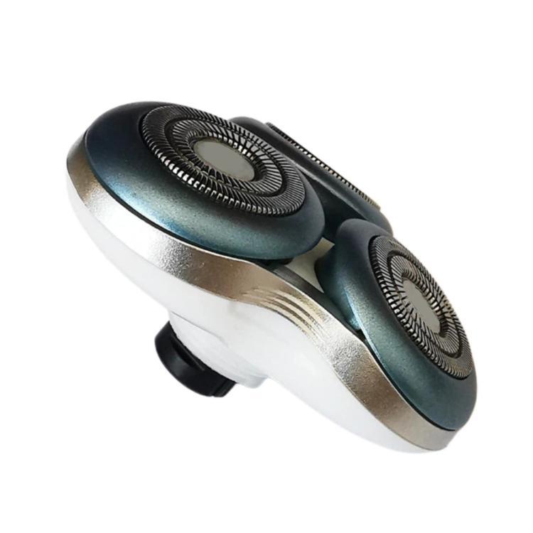 Metal and blue shaver cutter heads with dark foil rings, side view