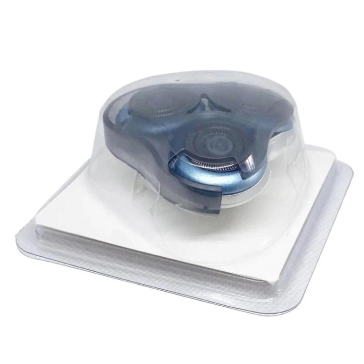 Shaver replacement cutter set in clear plastic tray with blue head