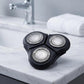 Shaver replacement head blade and net set, black triple foil head on bathroom counter.