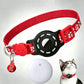 Smart cat collar with tracker, red band and black shell, reflective paw prints, white tag