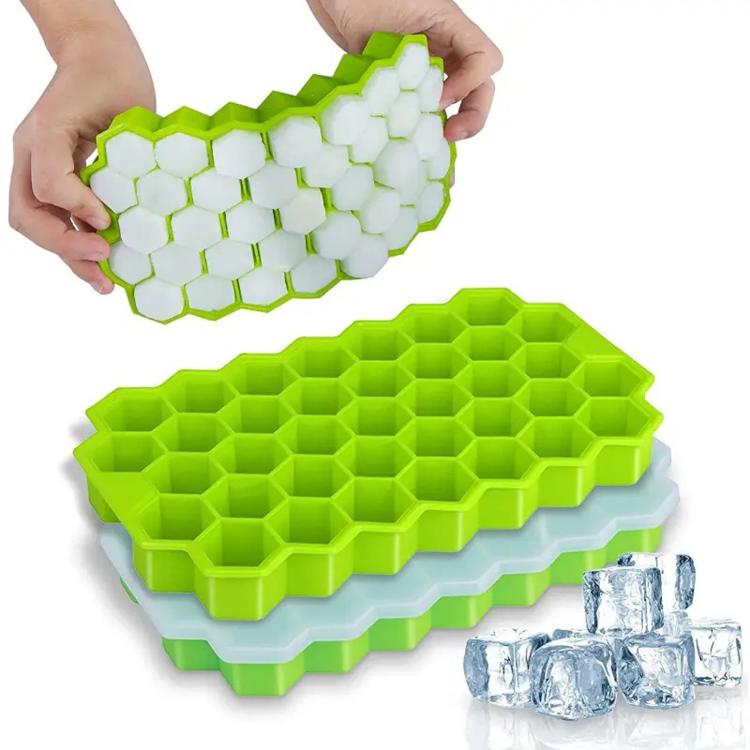 Honeycomb silicone ice cube tray with lid, bright green mold and clear ice cubes