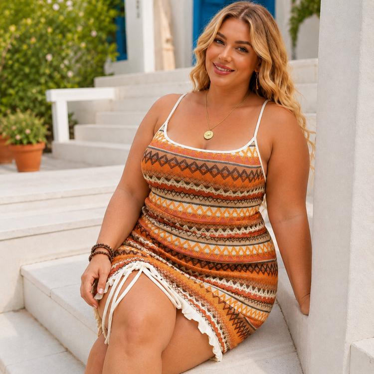 Women’s orange striped sundress with spaghetti straps and white tassel fringe
