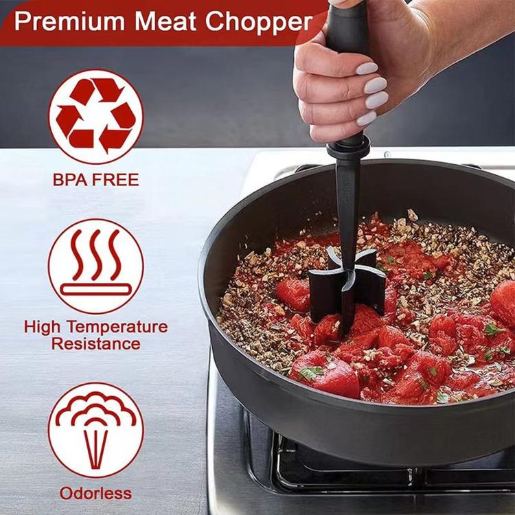 Black handheld meat chopper tool with pinwheel blades in a frying pan