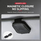 Black leather sunglasses holder clip mounted on car sun visor