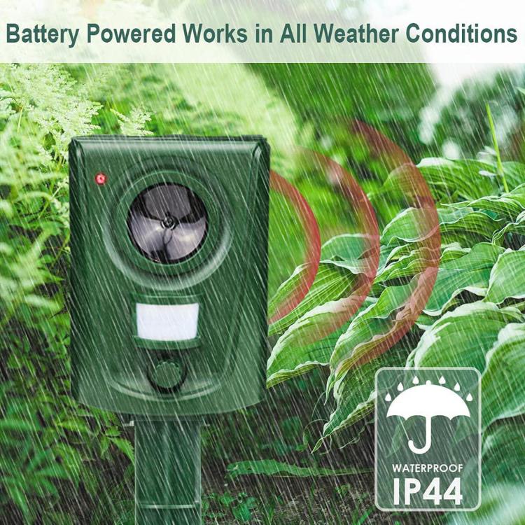 Green square repeller shown in rain with waterproof housing