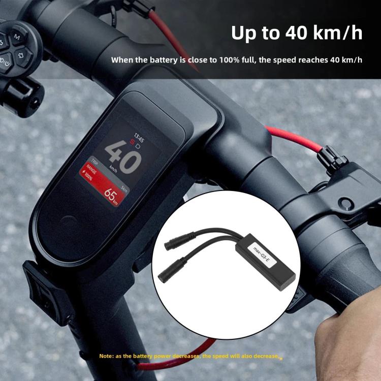 Electric scooter speed controller module mounted on handlebar with connected cables