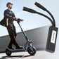 Electric scooter speed controller module connected by two cables near scooter handle