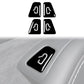 Installed door switch sticker with black base and white arrow icon on dashboard