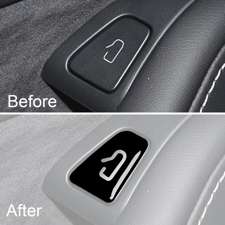 Door switch area with black sticker showing white arrow icon on light gray trim