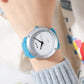 SKMEI unisex quartz watch with silver case, white dial, and light blue strap