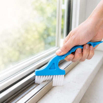 Window track cleaning brush with blue handle and white bristles for groove and edge cleaning
