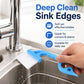 Sink edge cleaning brush with blue grip and white bristle head for tight corners