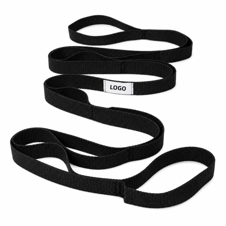 Black loop stretching strap, coiled, with small rectangular logo label