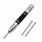 Automatic center punch with knurled silver tip, black grip, and two spare tips