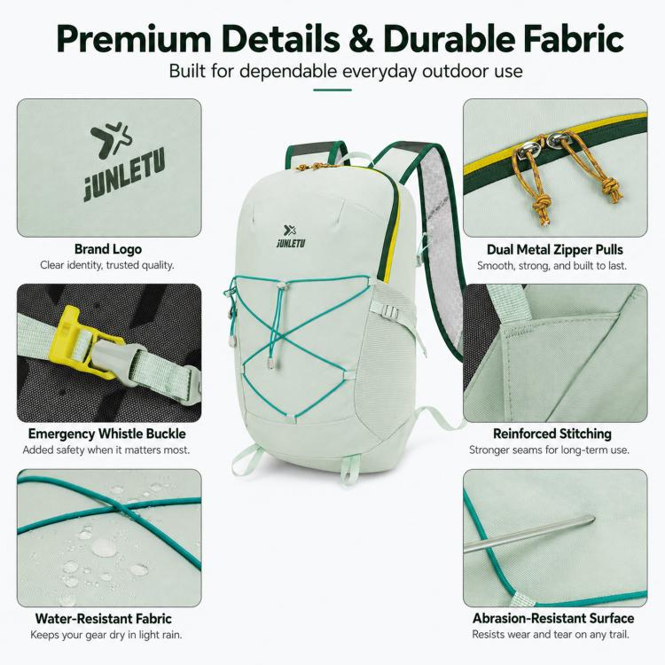 Light green outdoor backpack with dual metal zipper pulls, reinforced stitching, whistle buckle