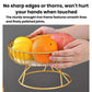 Round wrought iron fruit tray with gold frame and smooth edges, held by hands with fruit.