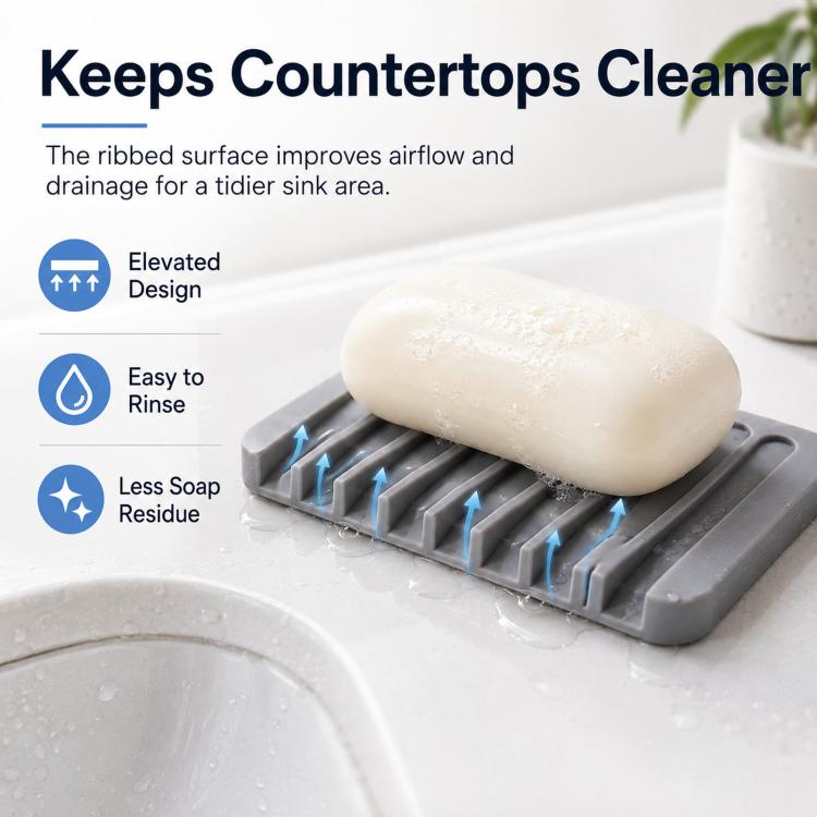Gray self-draining soap tray with a white bar of soap on raised ribs
