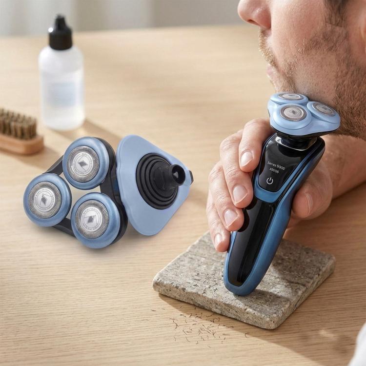 Blue shaver head blades with three circular foil cutters and orange housing