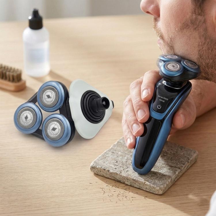 White and blue shaver head blades with three circular foil cutters