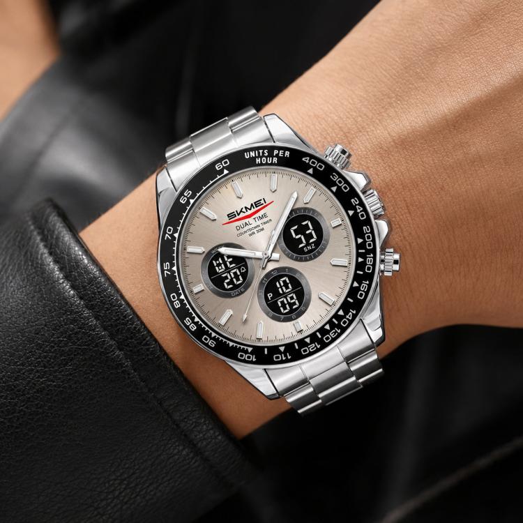 SKMEI silver triple-dial chronograph watch with light gray dial and stainless steel bracelet