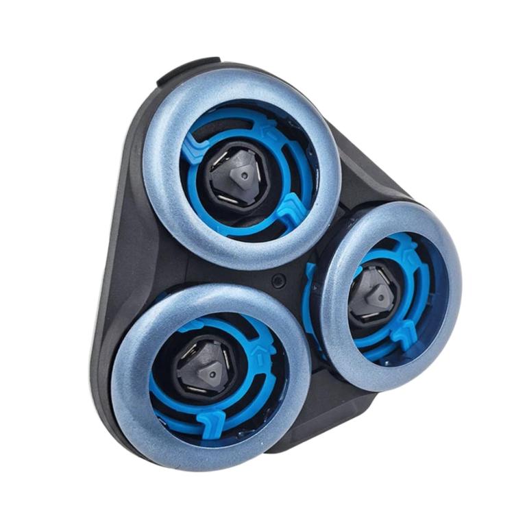 Three shaver head retainer cover bases with blue inner rings on gray frame