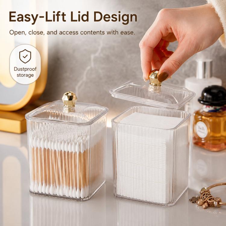 Clear storage box with gold-knob lid, one open for easy access