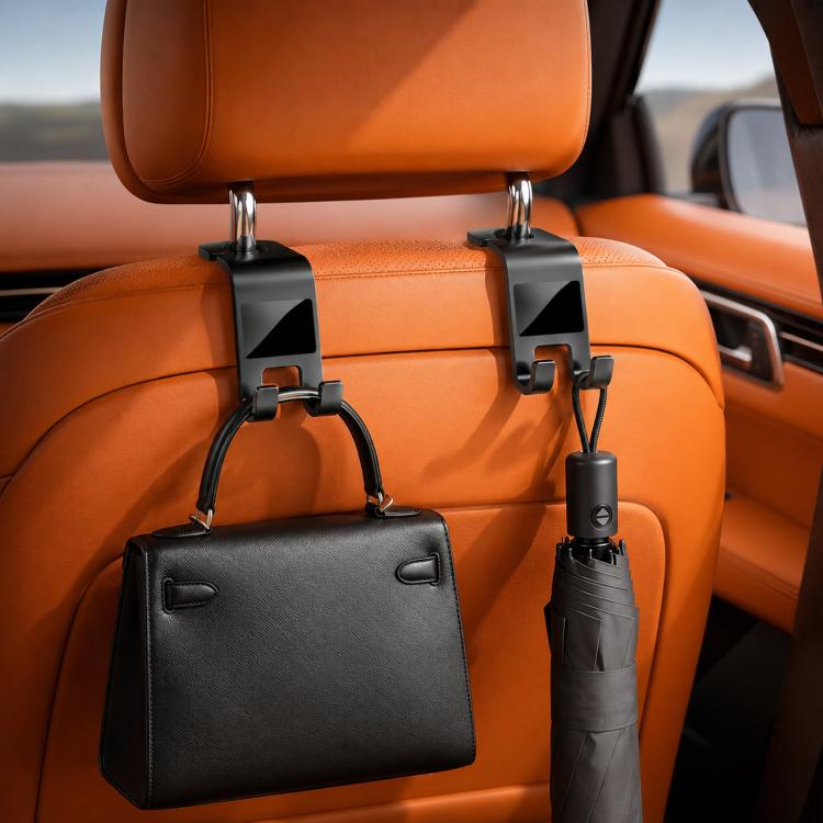 Car headrest hook set, black clips holding a bag on the seat back