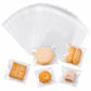 Clear self-sealing snack bags containing cookies and pastries, assorted pieces