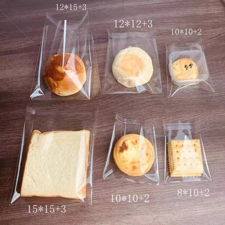 Assorted clear self-sealing snack bags with baked goods, multiple bag sizes