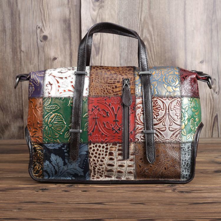 Women’s vintage patchwork travel bag with two top handles and zip closure