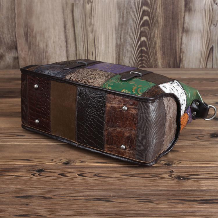 Vintage patchwork travel tote with dual handles, metal studs, and zip top