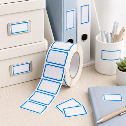 Self-adhesive blank file labels roll with blue border frames on white label sheets