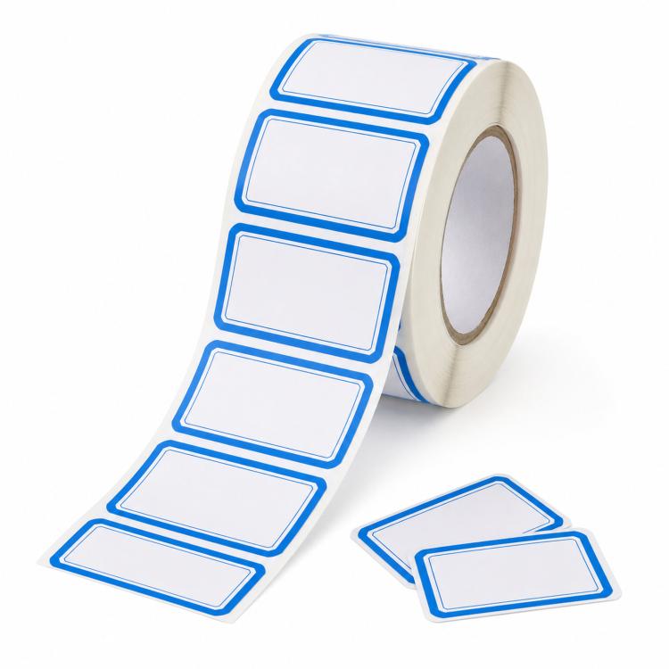 Self-adhesive blank labels roll with blue bordered rectangles and loose label pieces