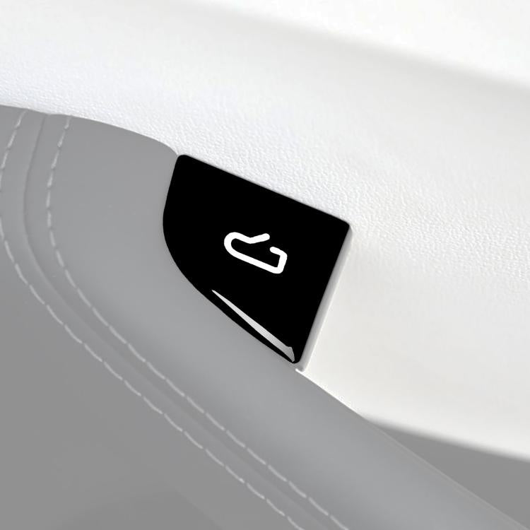 Black door switch sticker with white lock icon on car door panel
