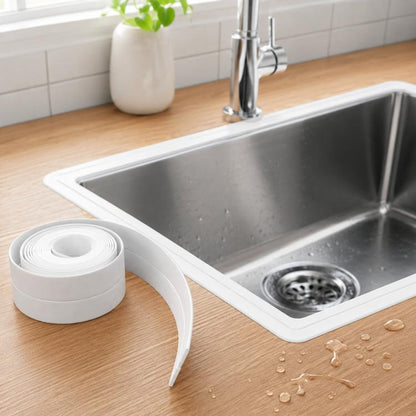 White self-adhesive caulk tape strip with peel backing along sink corner