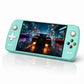 Mint green handheld gaming console with thumbsticks and 7-inch touchscreen