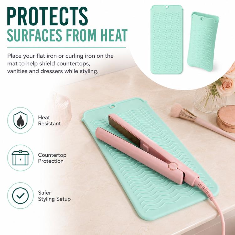 Mint teal silicone heat mat with ridged wave surface, laid flat on countertop