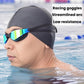 Man wearing teal-tinted racing swim goggles while training in open water