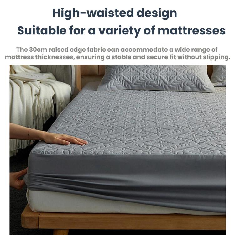 Waterproof fitted crib sheet with raised high-edge border for secure, snug mattress fit.